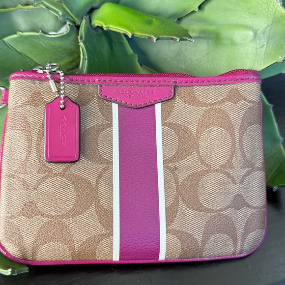 Coach Handbags - Coach signature waxed canvas & genuine leather wristlet clutch pink/purple